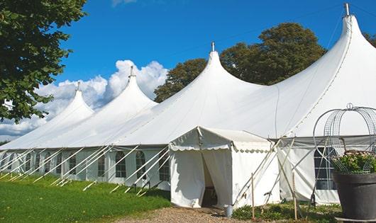 high-quality porta potties stationed at a wedding, meeting the needs of guests throughout the outdoor reception in Orange Cove